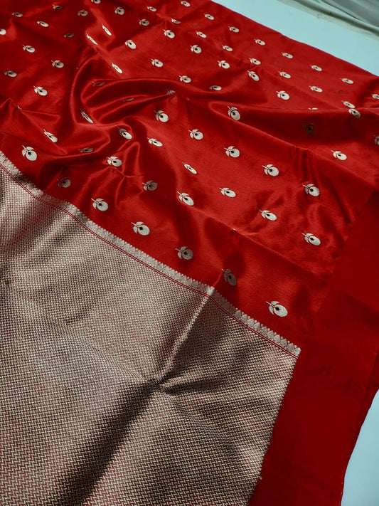 Red Chanderi saree draped styling highlighting rich color and traditional zari detailing