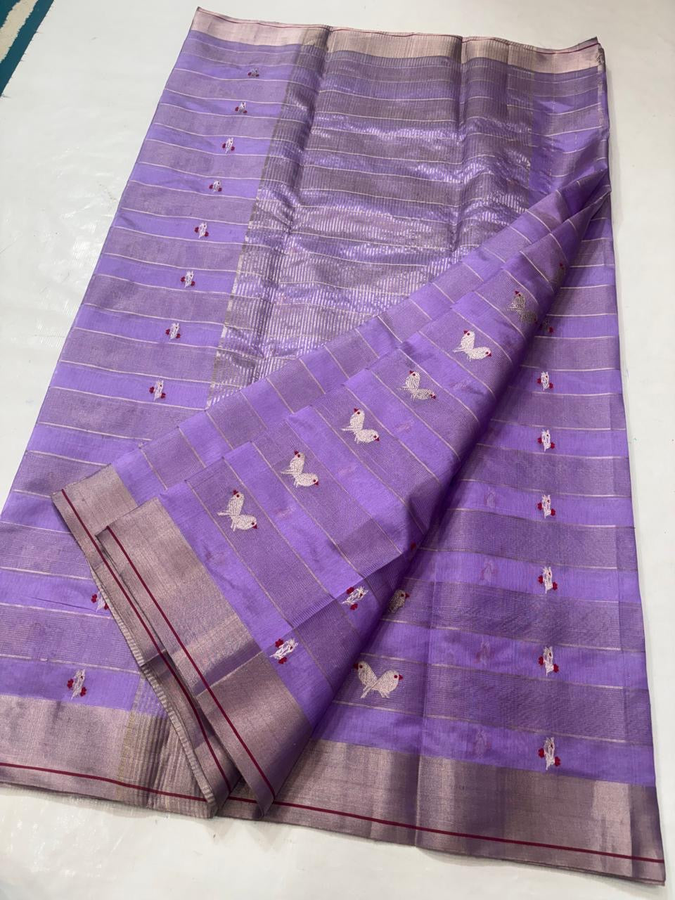 Full view of lavender Chanderi handloom silk saree showing bird motifs and broad shimmering borders