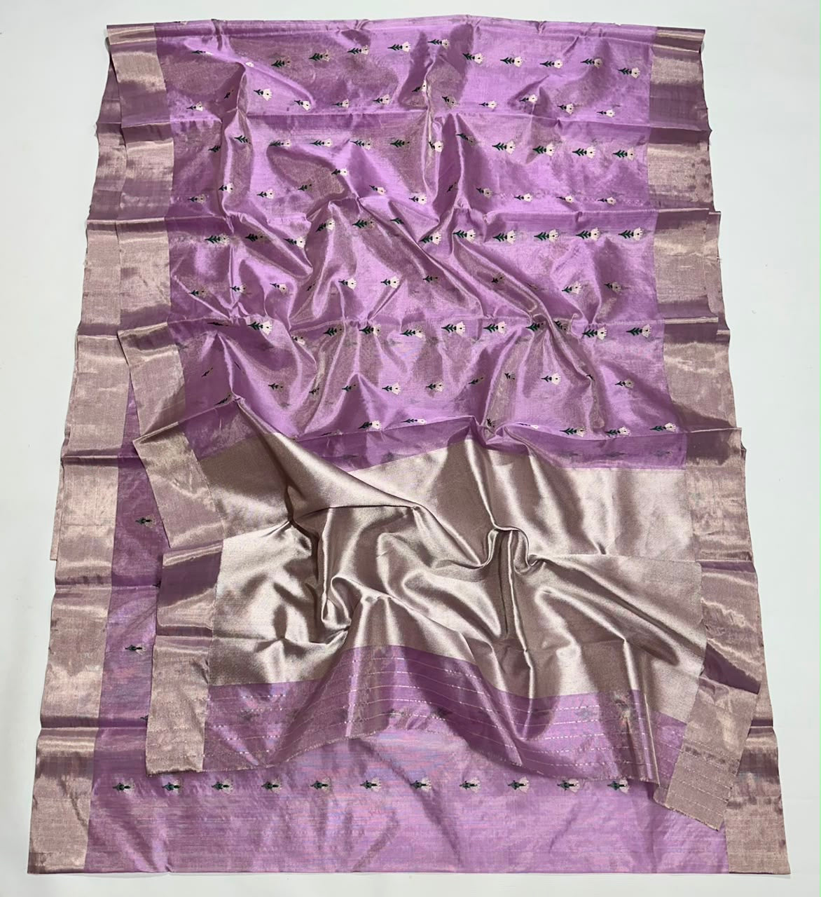 Pure Silk Chanderi saree in lilac, metallic tissue pallu draped over the shoulder