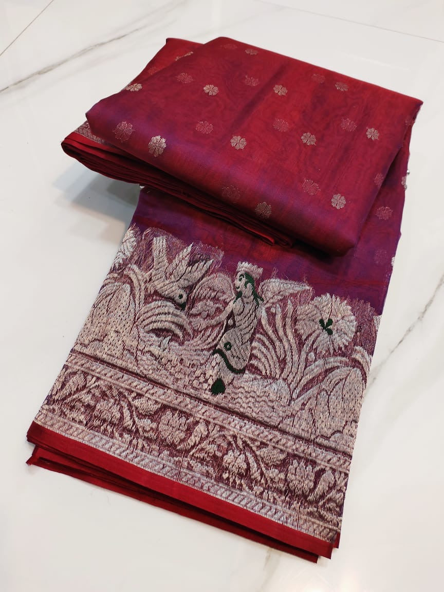 Open berry red Chanderi handloom saree showing silver-rose pallu, botanical border and bright red edging