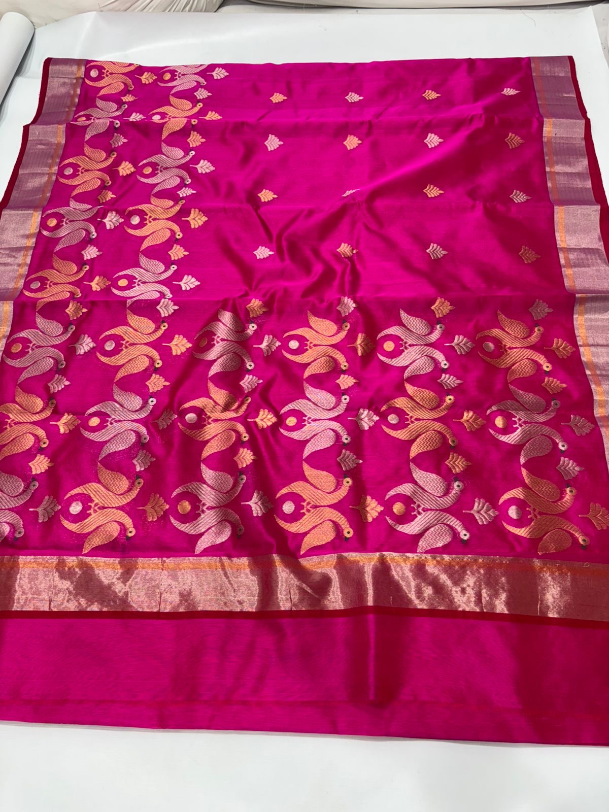 Handwoven pink Chanderi saree with large peacock motifs