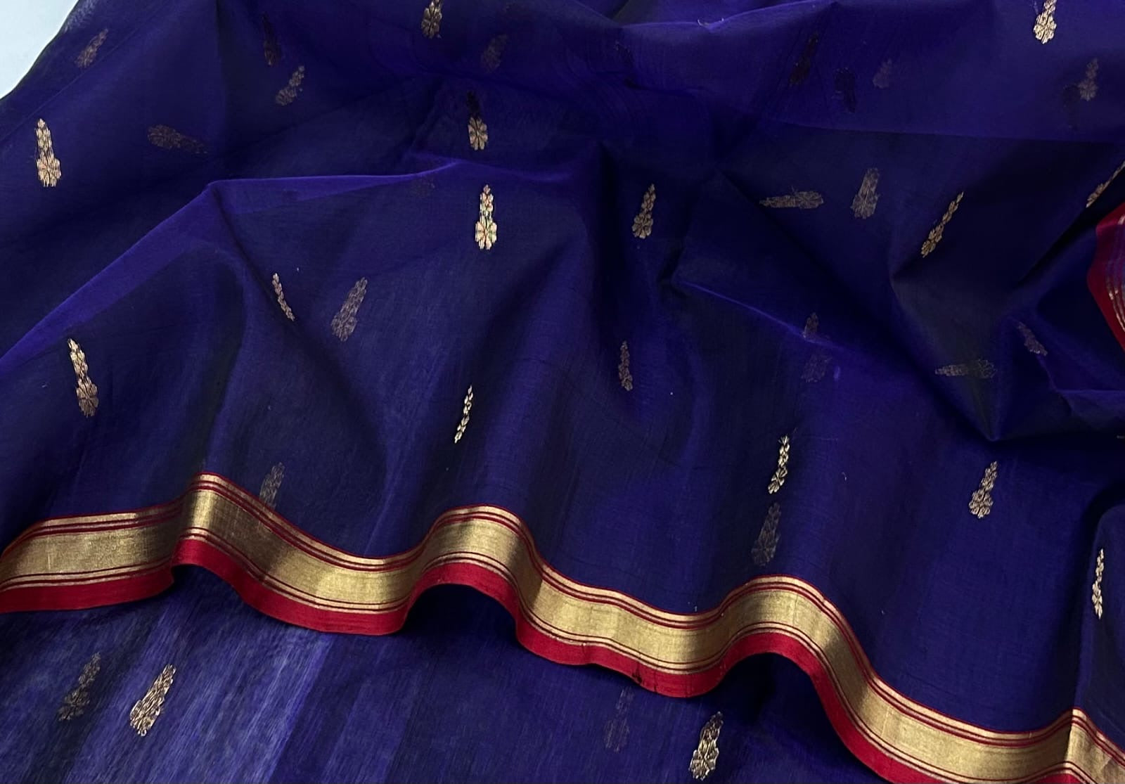Royal blue pure silk Chanderi handloom saree with gold zari motifs and red border