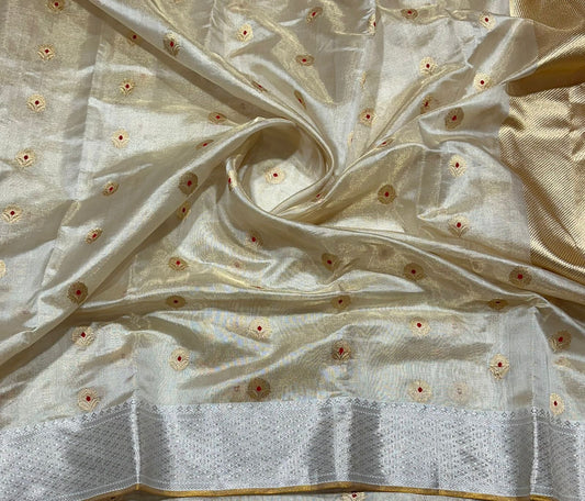 Warm Pearl Luminance Pure Silk Chanderi Saree neatly folded with Antique Gold Butta Border