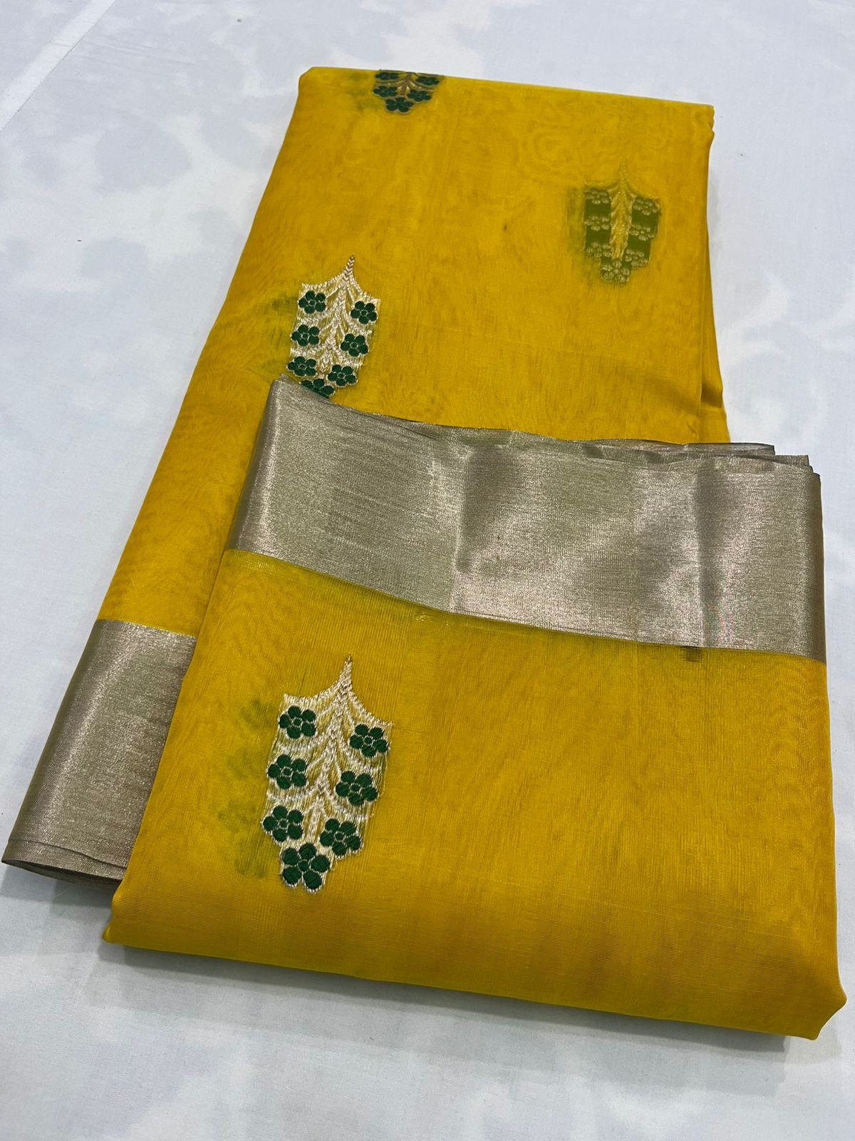 Golden mustard Chanderi silk saree with elegant silver zari pallu