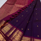 Royal purple Kanjipuram saree — raspberry pink and gold border detail