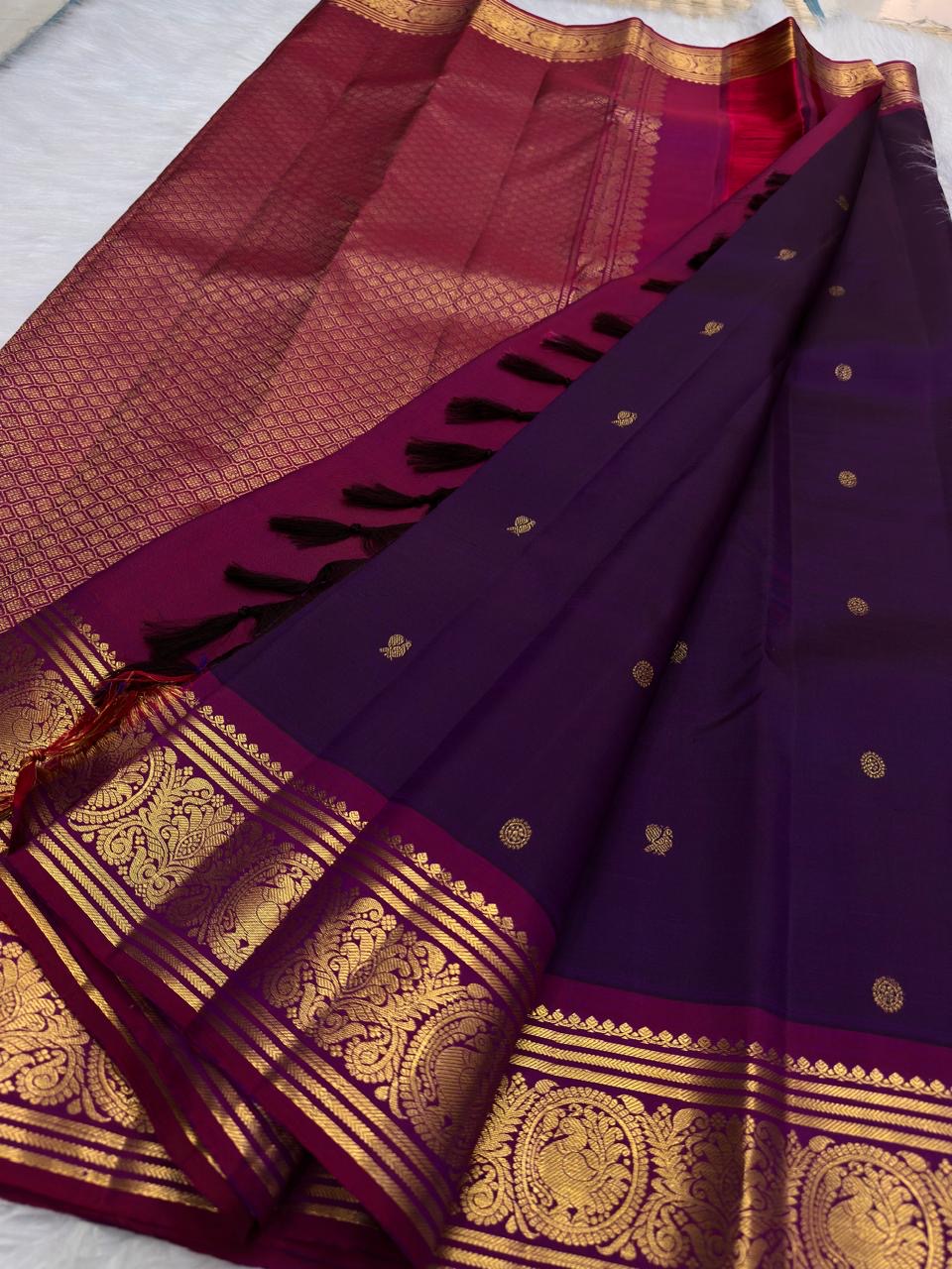 Royal purple Kanjipuram saree — raspberry pink and gold border detail