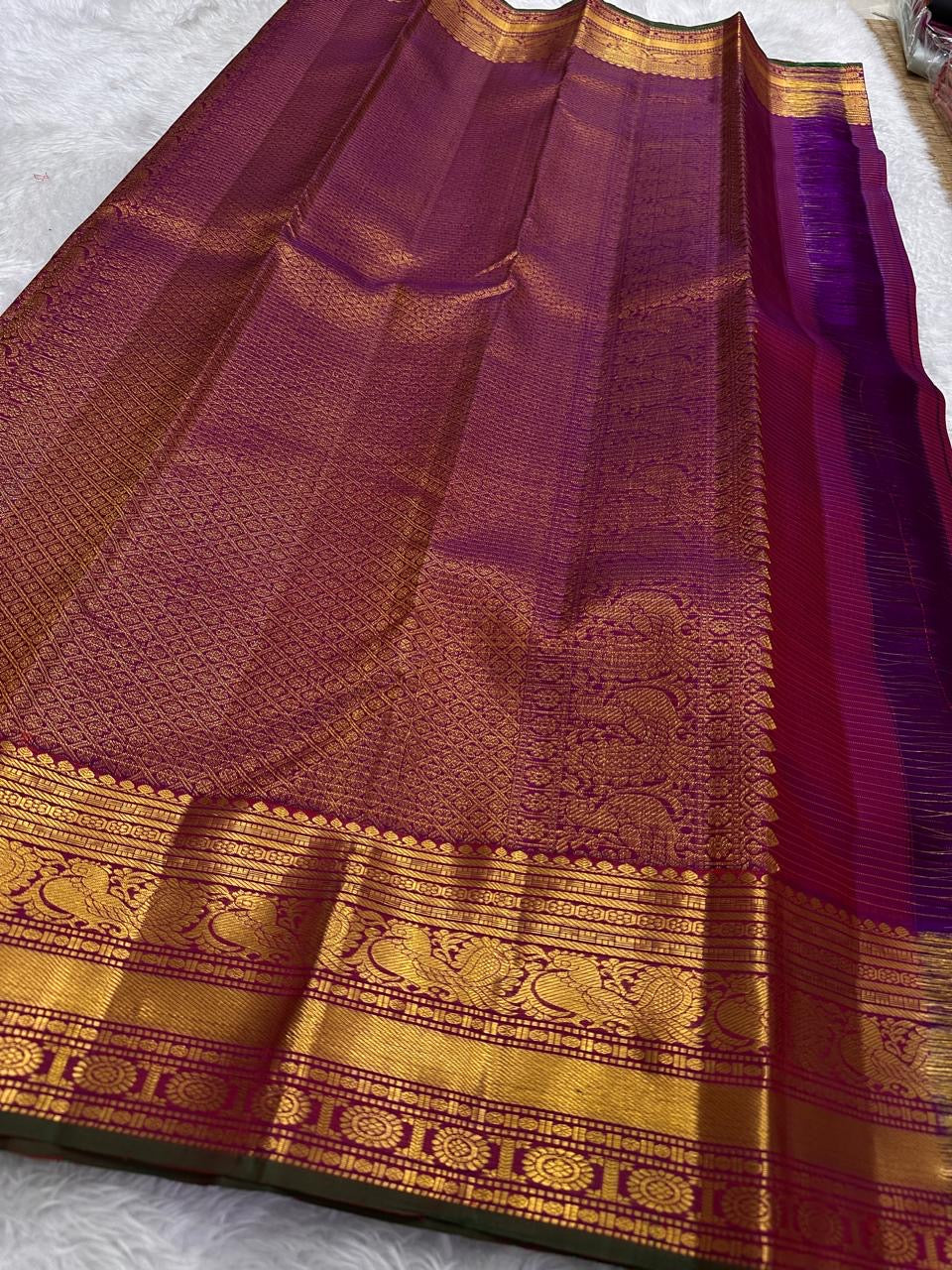 Royal Purple and Antique Gold Handwoven Pure Silk Kanjeevaram Saree with Zari Kattam and Mayil Chakram Border