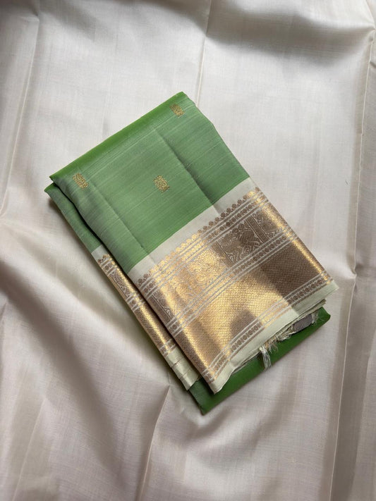 Fresh pistachio green Kancheepuram saree, pure silk Korvai weave — Idam Living.
