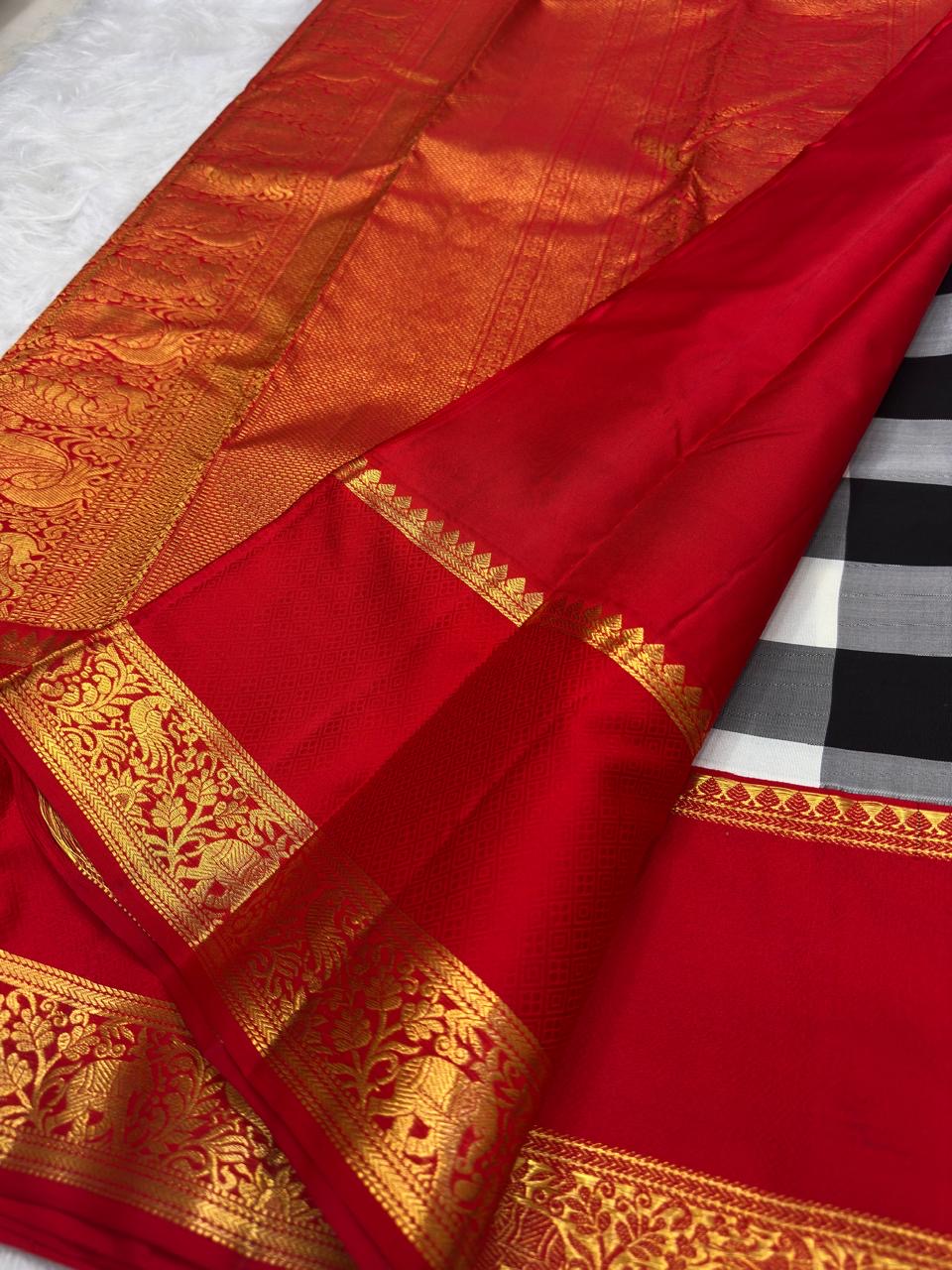 Black, Grey and Ivory pure silk KanchiPattu saree, Kanchi Kattam weave with Pillar-Box Red border — body weave close-up