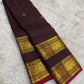 Handwoven pure silk Kanjipuram saree in deep wine plum with Rettapet Pavun coin butta and ornate Maanga Yaanai antique gold zari border Silk Mark certified