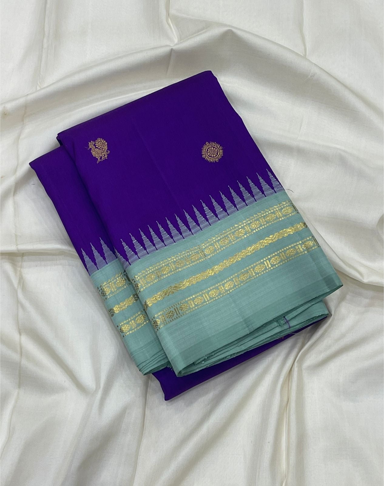 Mayil Chakram peacock medallion butta detail in silver zari on royal violet blue handwoven Kanjeevaram silk saree