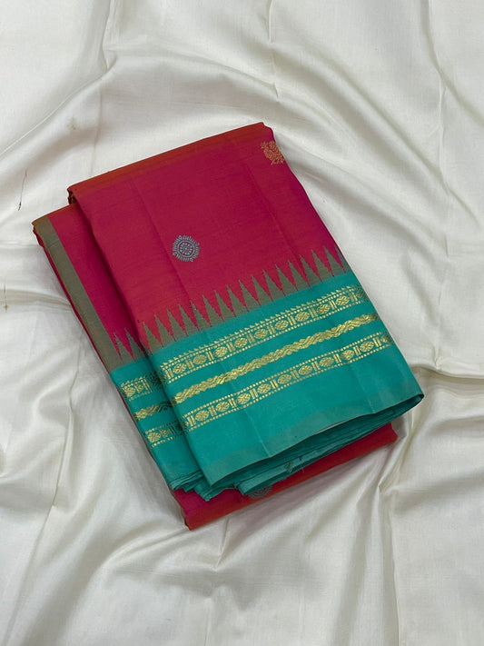 Shot colour tomato red pink and teal Kancheepuram saree with Mayil Chakram butta and Korvai Varisaipet border overview