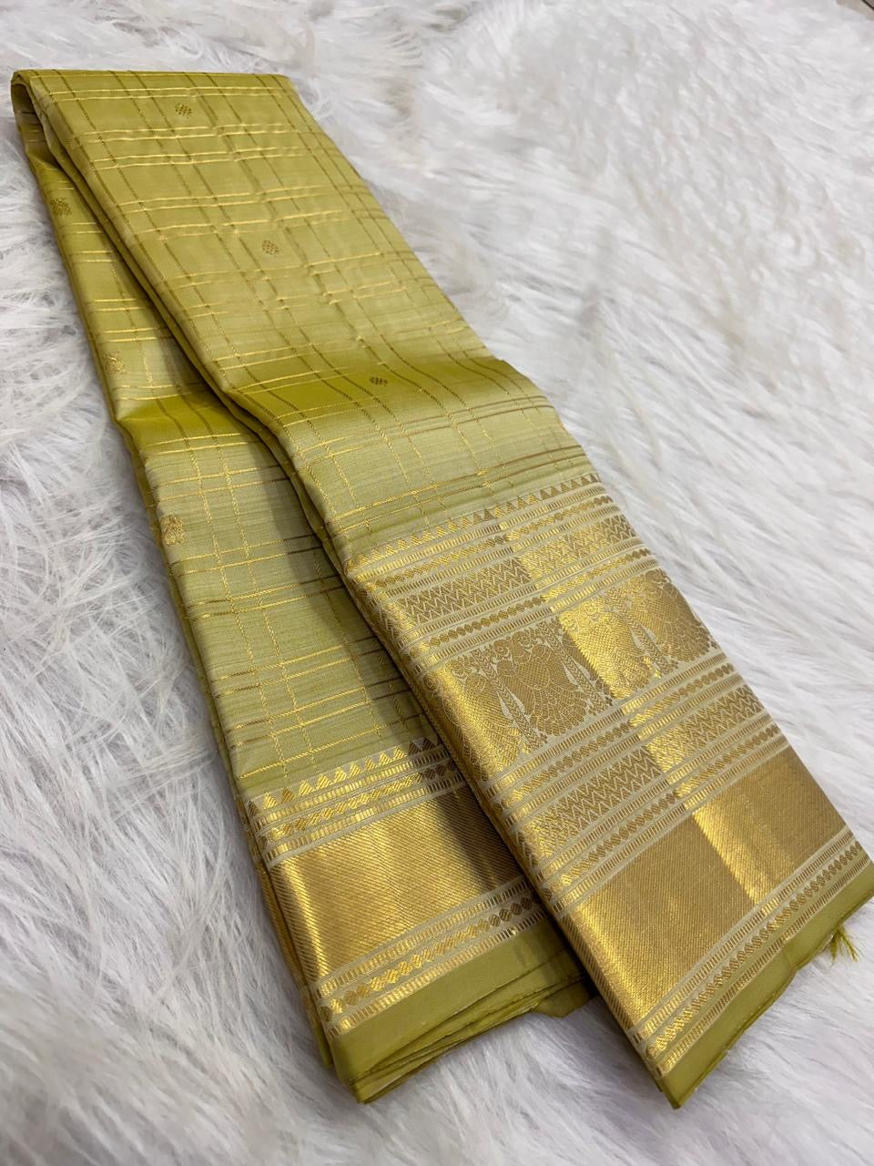 Peridot Green pure silk Kanjeevaram saree, Varisaipet weave with Gold Zari border — full drape view