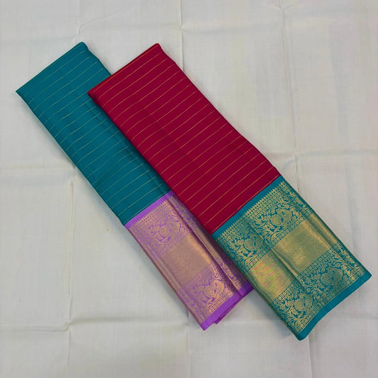 Raspberry Pink pure silk Kanjeevaram saree, Korvai weave with Peacock Teal Zari border — folded view