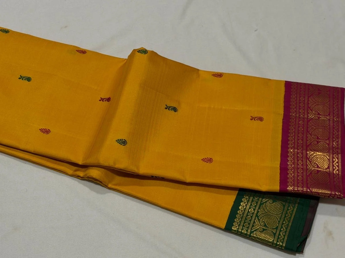 Pure silk Kanchipuram saree in mustard yellow with bottle green and magenta contrast borders, Silk Mark certified, handwoven in Tamil Nadu