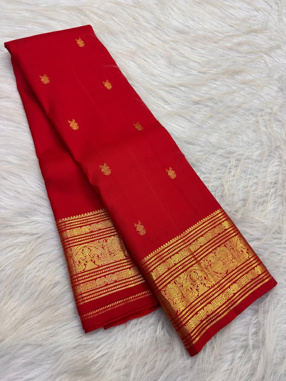 Pure Silk Kanjeevaram saree with ceremonial bird panels and floral gold zari
