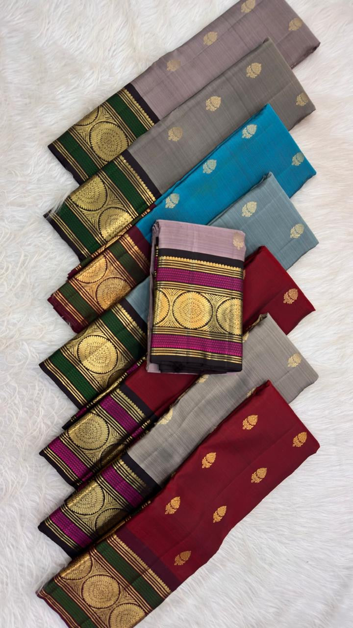 Pure Silk Kanjeevaram Butta saree with large Kamalam zari border motifs