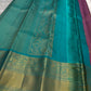 Pure Silk Kanjeevaram Butta saree with Maanga motifs and jewel-toned turquoise contrast