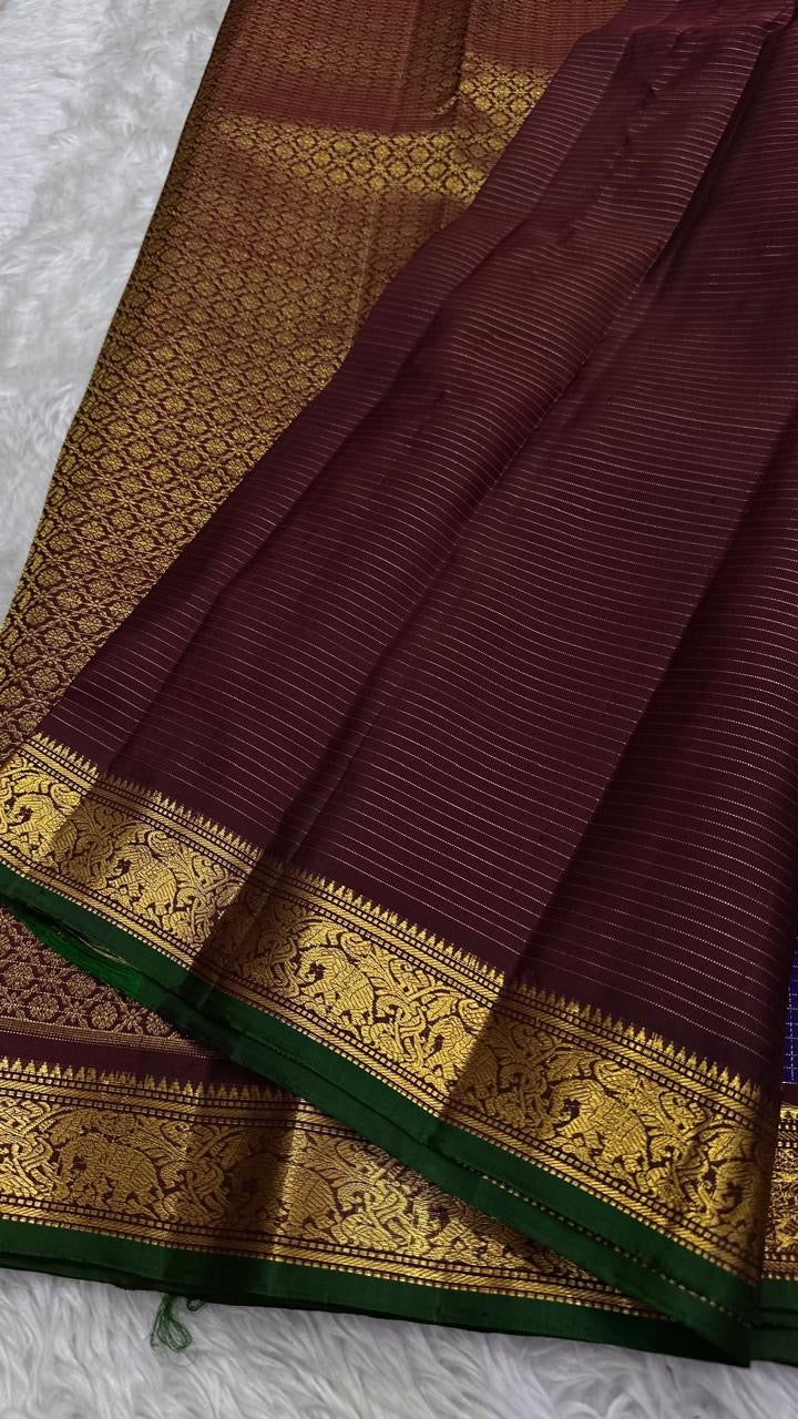 Pure Silk Kanjeevaram saree with traditional Yaanai elephant zari border