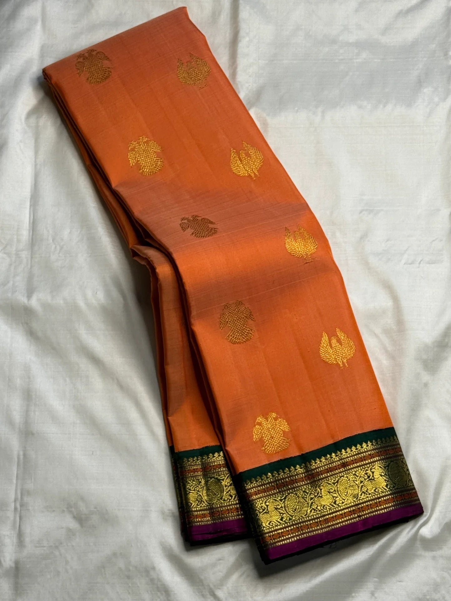 Pure Silk Kanjivaram saree with Patchi-in-Flight antique gold zari buttas