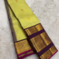 Lime chartreuse and deep purple handwoven pure silk Kanjipuram saree with Kudhirai flying horse butta and Kai Korvai antique gold zari border overview