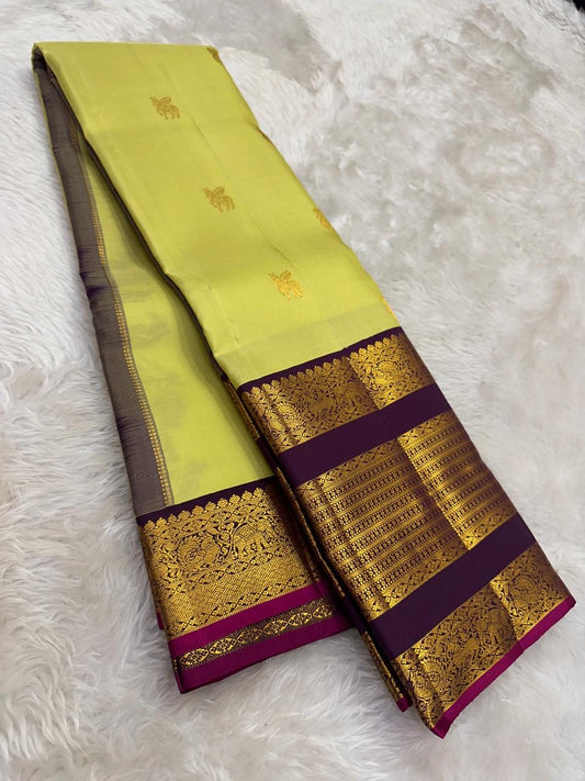 Lime chartreuse and deep purple handwoven pure silk Kanjipuram saree with Kudhirai flying horse butta and Kai Korvai antique gold zari border overview
