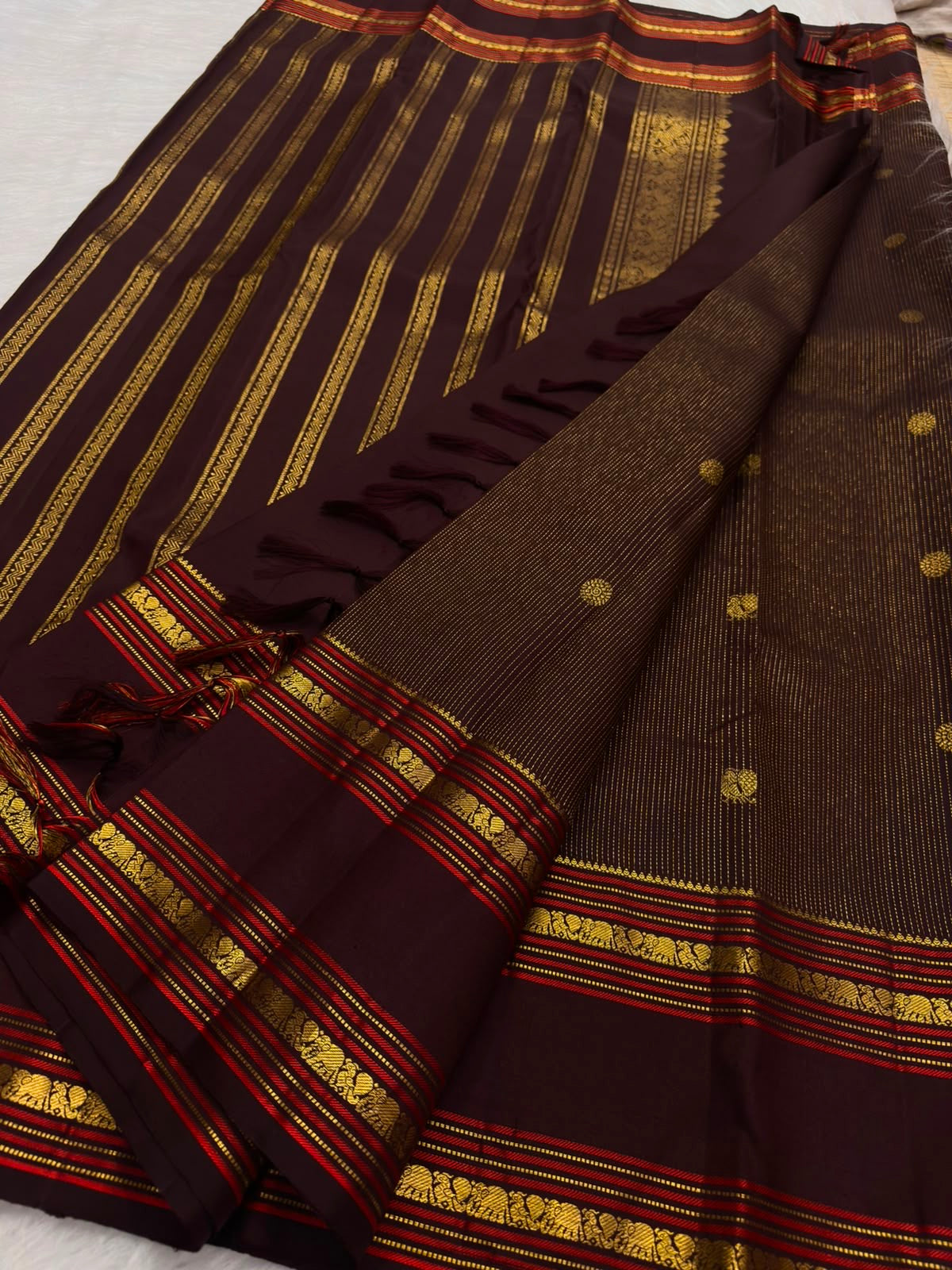 Handwoven Deep Kaapi Maroon Kanchipuram silk saree, pallu detail, Oosivaanam-style vertical lines