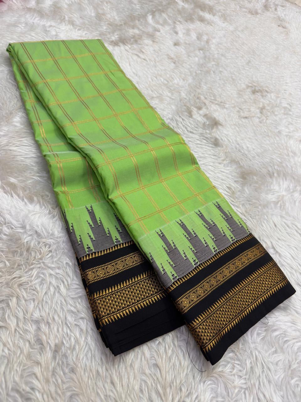 Pure Arani silk saree with elegant checkered body and temple border