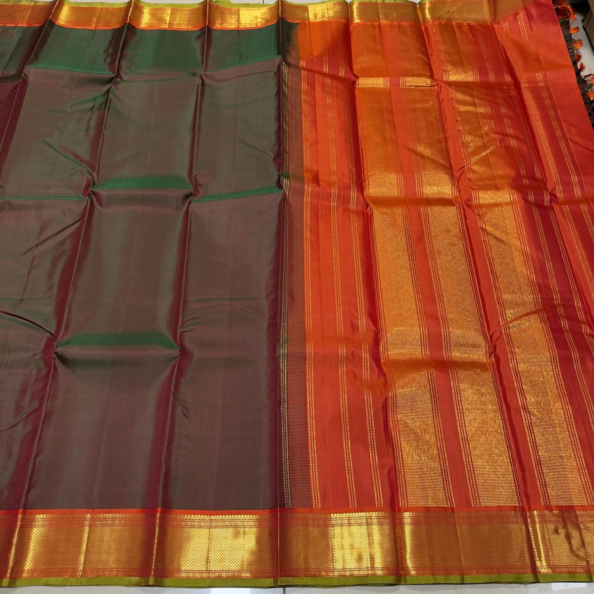 Manthulir green and kesari orange handwoven pure silk Kancheepuram saree with bawanchi borders, view 5