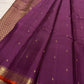 Close view of antique-gold leaf buttas on Muted Vadamalli Purple Kanjivaram silk.