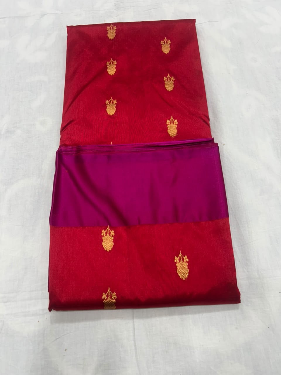 Broad golden pallu on red Chanderi saree