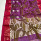 Orchid Purple handloom Chanderi saree opened to show Raspberry Pink floral border, silver blooms and luminous pallu