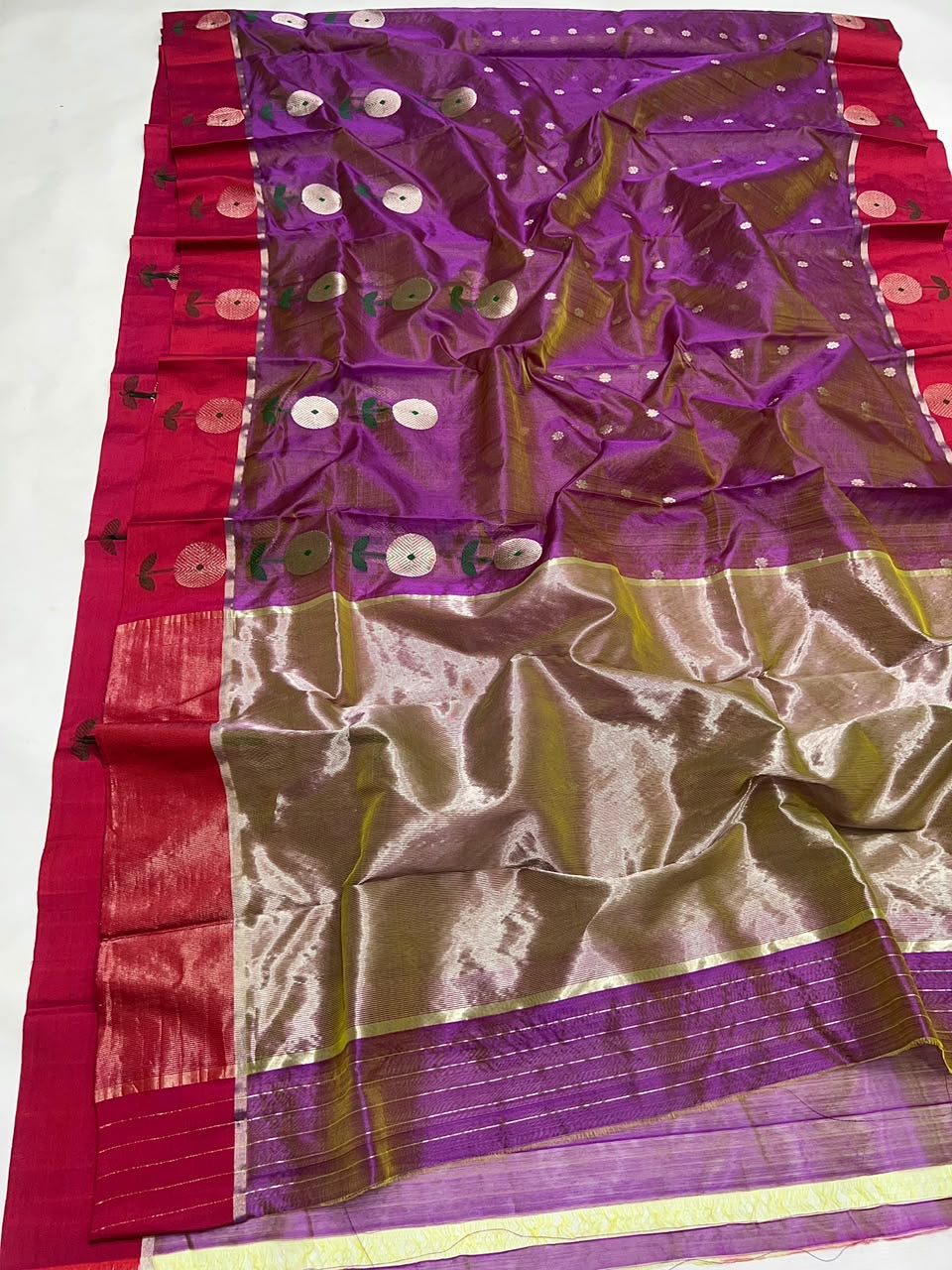Orchid Purple handloom Chanderi saree opened to show Raspberry Pink floral border, silver blooms and luminous pallu