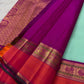 Detail of purple and coral Korvai border interwoven with silk thread, gold zari and Mayil motifs.