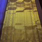 Deep Brown Korvai pallu with dense antique-gold zari weaving.