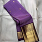 Pure Kanchipuram silk saree in purple with small antique gold butta motifs and a broad antique gold zari border, folded view