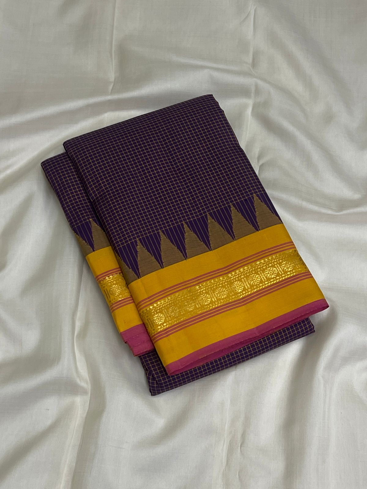 Full view of the miniature purple and gold zari check pattern across the saree body