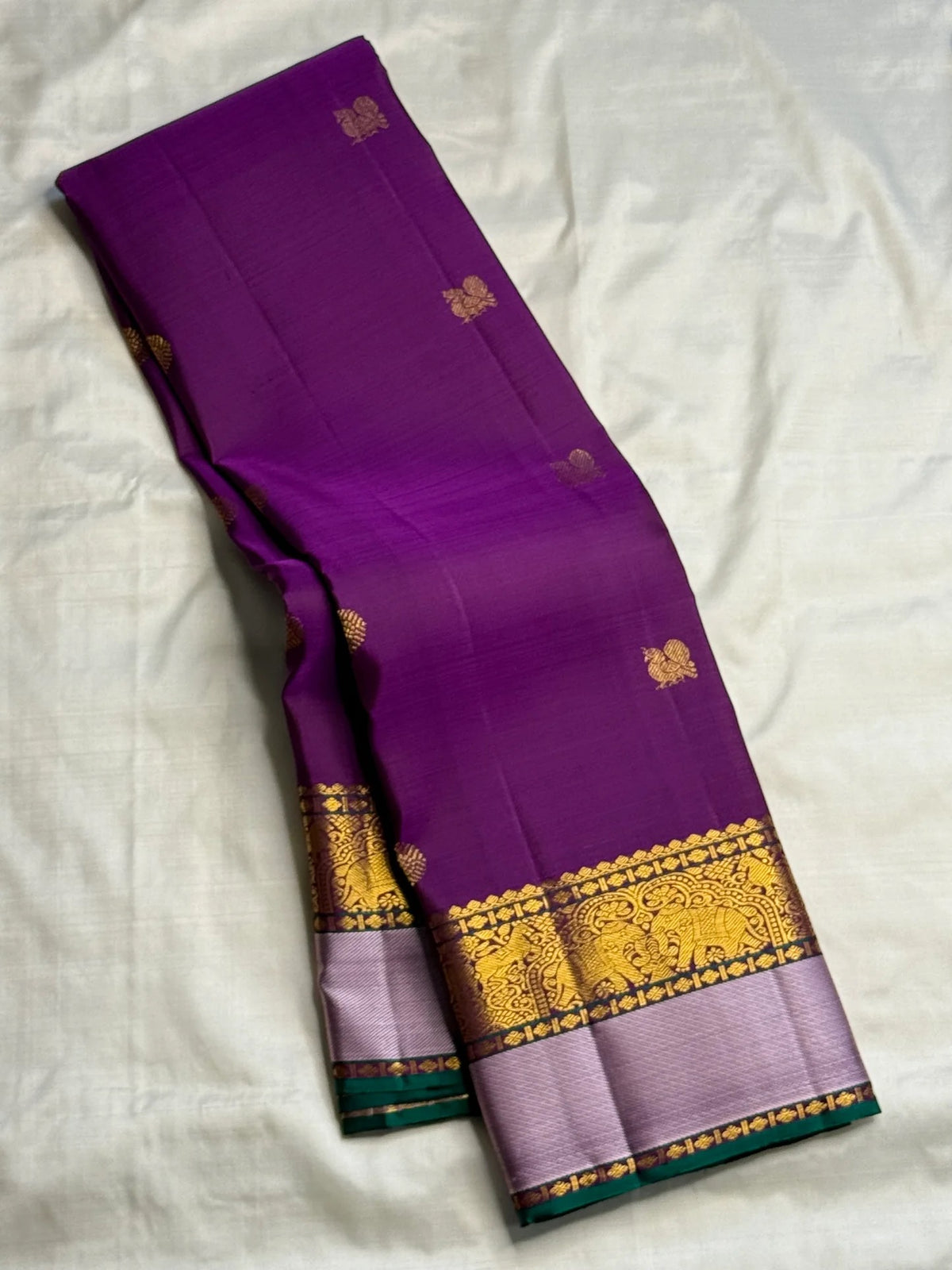 Kathiripoo Purple Pure Silk Kanchipuram Butta saree.