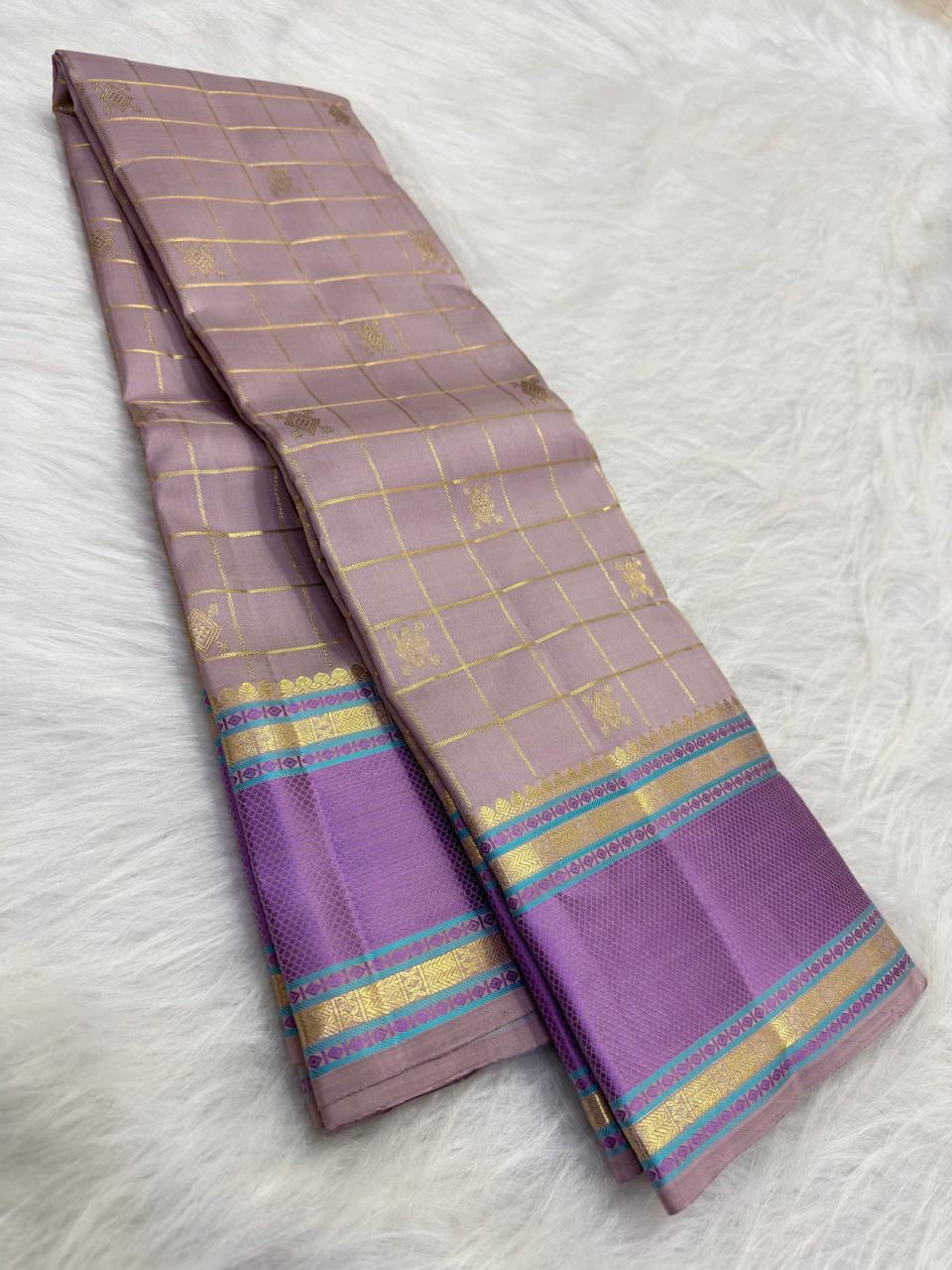 Dusty-lilac pure silk Kanjivaram saree, folded view — Idam Living