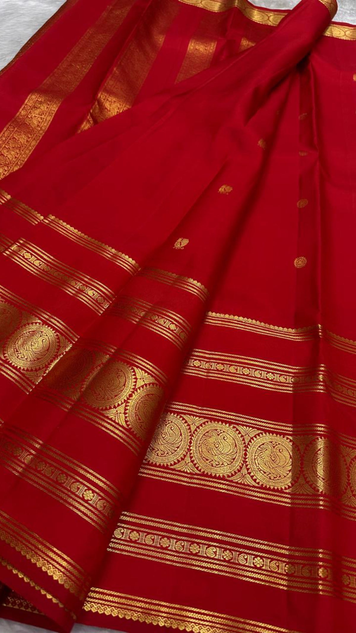 Deep Vermilion Red pure silk Kanchipuram Varisaipet saree, decorative seer zari weaving.