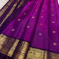 Purple handloom Kanjivaram silk saree with traditional gold zari close-up