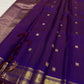 Deep Violet Purple pure silk Butta saree with petite traditional gold zari peacock border.