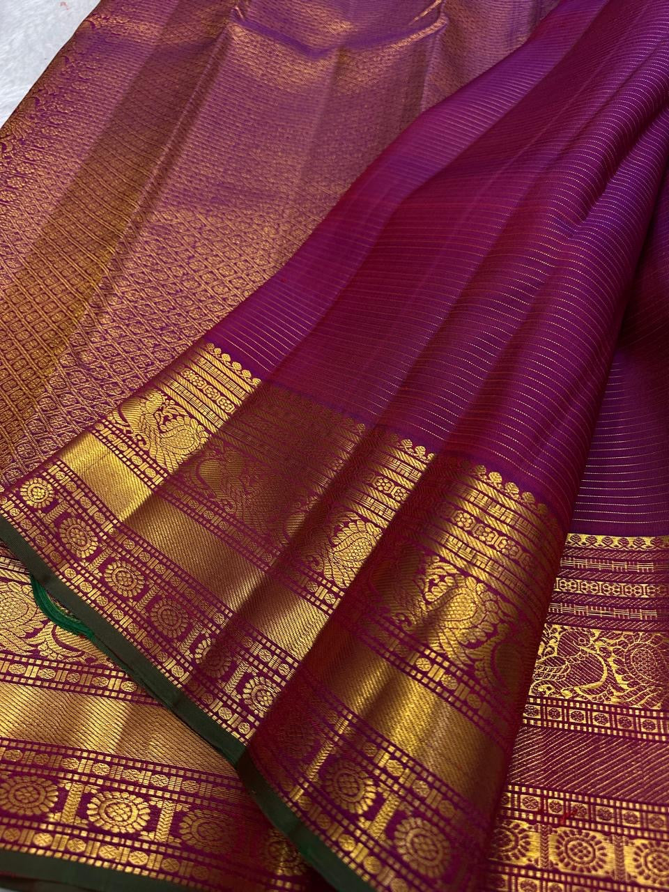 Royal Purple and Antique Gold Handwoven Pure Silk Kanjeevaram Saree with Zari Kattam and Mayil Chakram Border