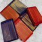 Floral classic-gold zari ornament against Deep Kathiripoo Purple silk.