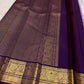 Lavender purple Kanjeevaram saree — antique-gold zari peacock border motif close-up