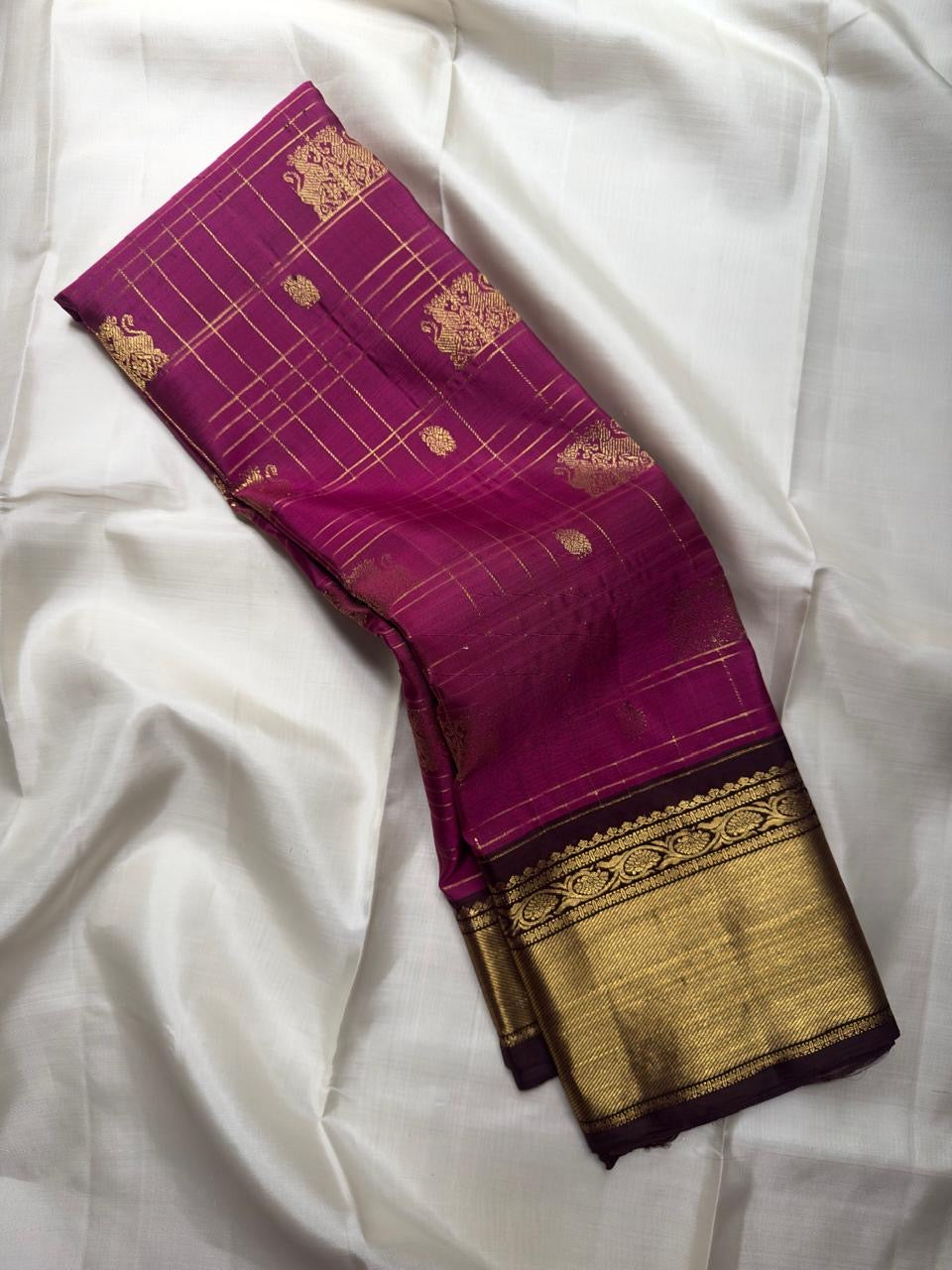 Raspberry purple pure silk KanchiPattu saree — antique-gold zari border and pallu detail