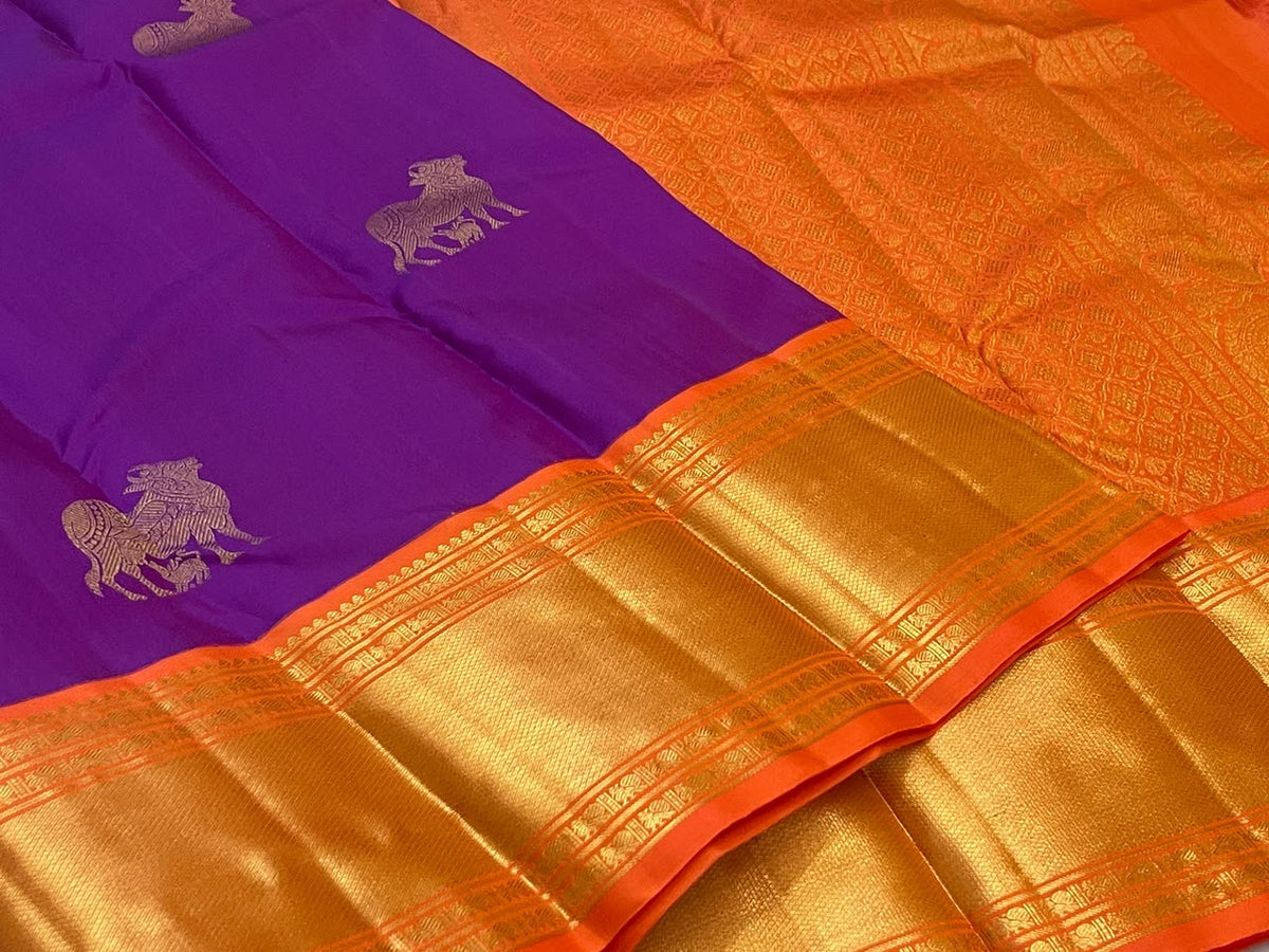 Royal Purple Kanjivaram saree with large traditional cow zari buttas
