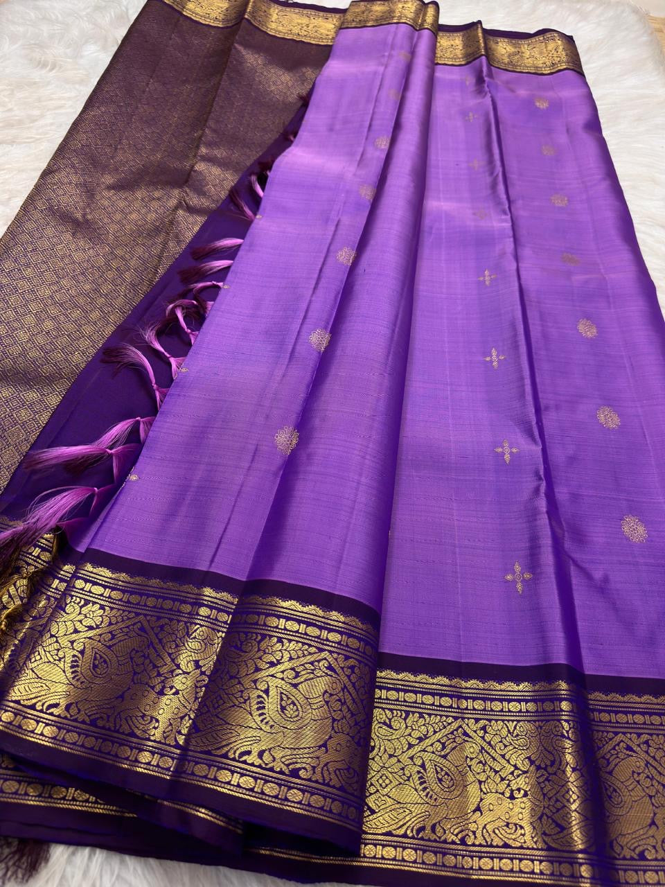 Gandaberunda gold-zari buttas on lavender Kanchipuram silk