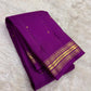 Tonal purple Kanjivaram border finished with repeated fine parallel classic-gold zari lines.