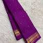 Handwoven Pure Silk Kanjivaram Butta saree with an open purple body and small gold zari clusters.